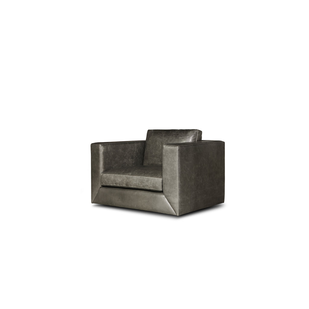 angled view of the Urbano Swivel Chair by Hand & Grain