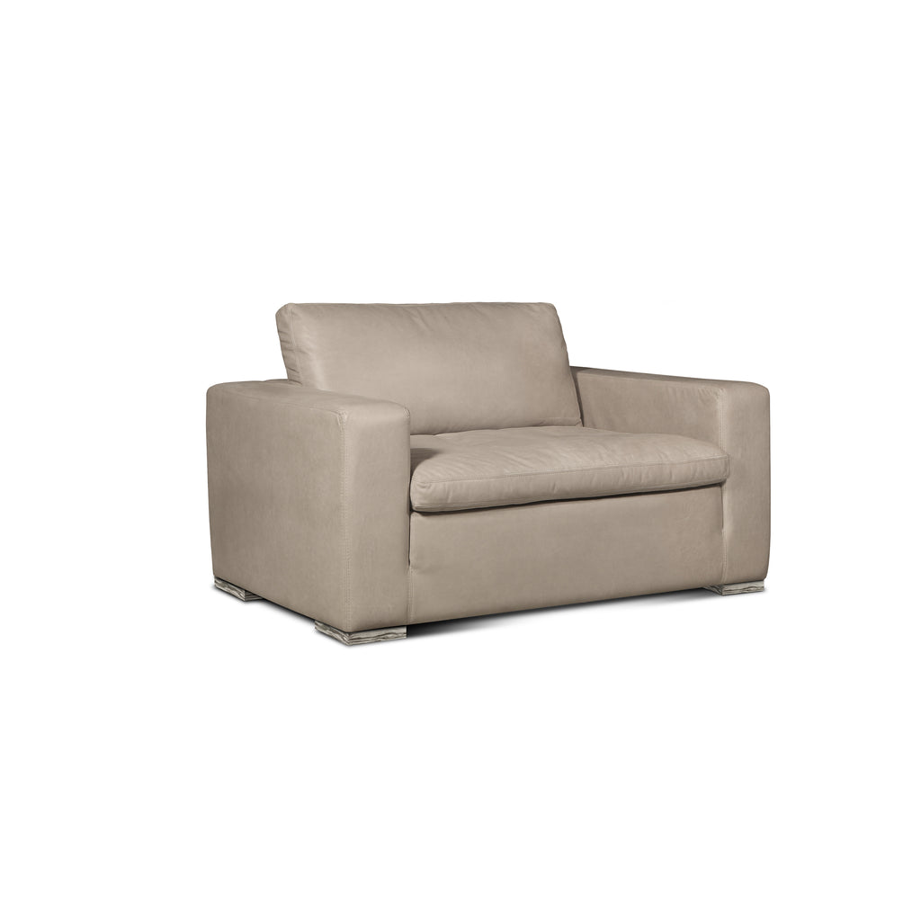 angled view of the Hand & Grain Aksel Chair and a Half
